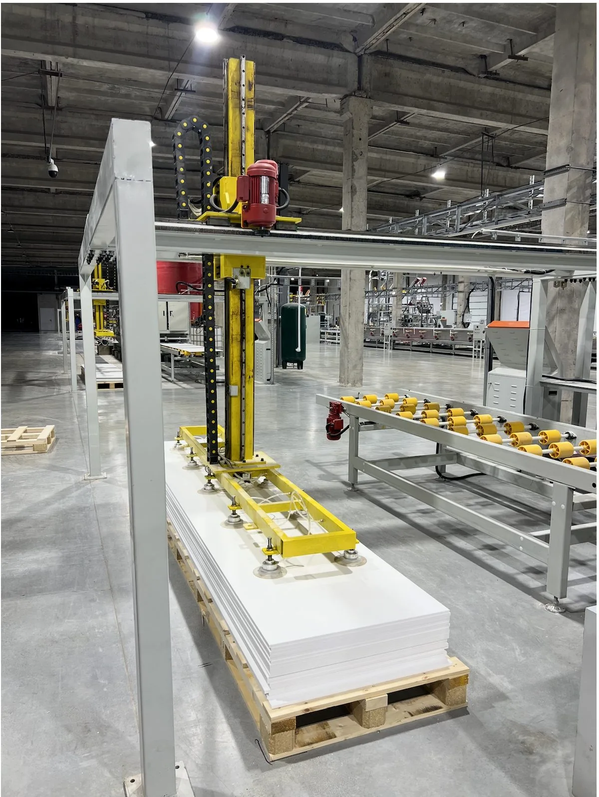 LISTACRYL vacuum stacker placing finished acrylic solid surface sheets on a pallet